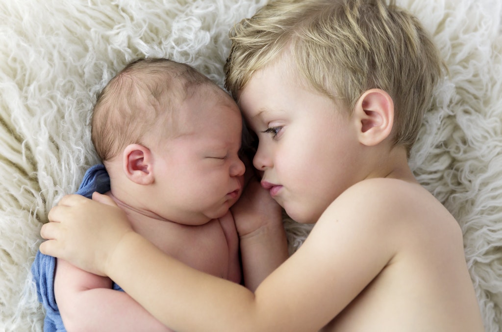 Newborn with sibling