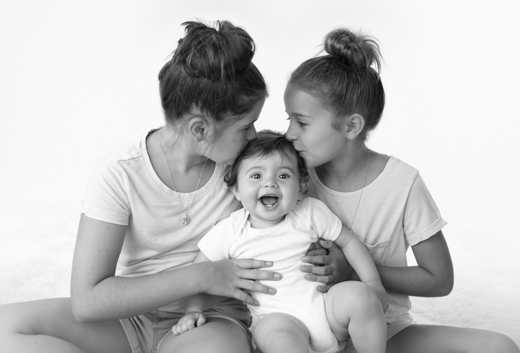 baby with siblings
